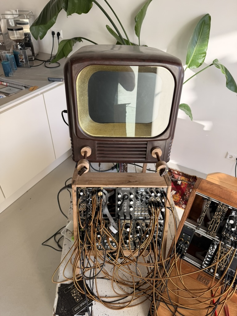 Meditation Station — bakelite television on top of patched modular synthesizer
